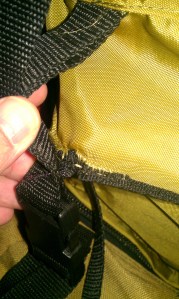 Close-up of top flap strap repair.